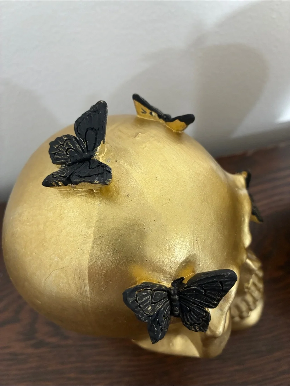 NWT- Set of 2- STUNNING- Gold Skull Statues with Black Butterflies Accents